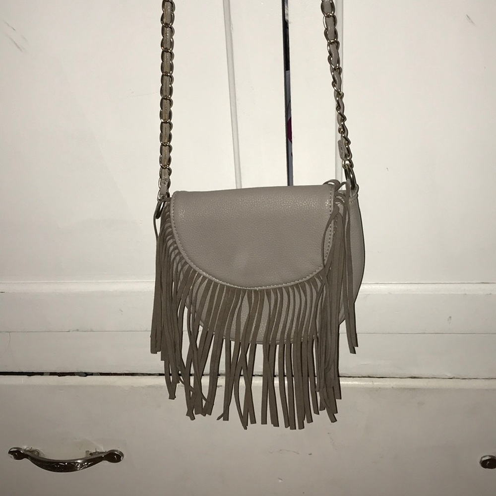 grey strap bag with grey frills